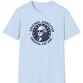 Light blue t-shirt with graphic design and text on a white background